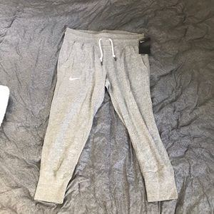 woman gray nike capri sweatpants